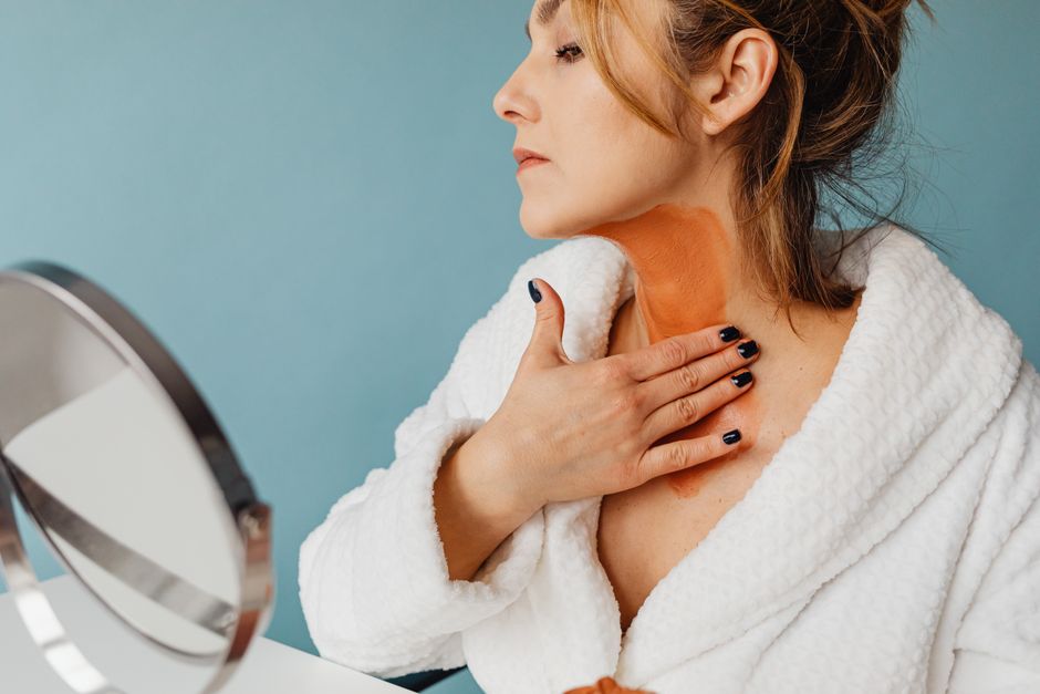 Person applying cooling gel to neck